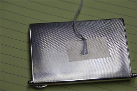 A 1920s/1930s continental silver and enamel rectangular minaudiere, gross 4.5 oz.